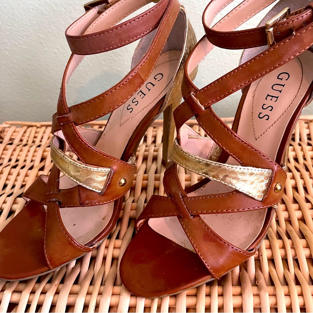 Guess, high heeled strapy sandals in gold alligator and tan leather. Size 6.